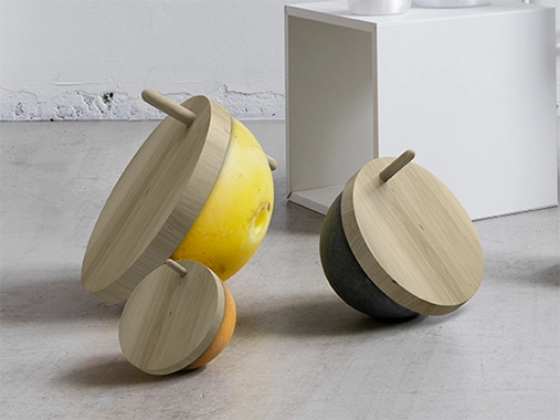 Storage containers made from cut fishing buoys with wooden lids